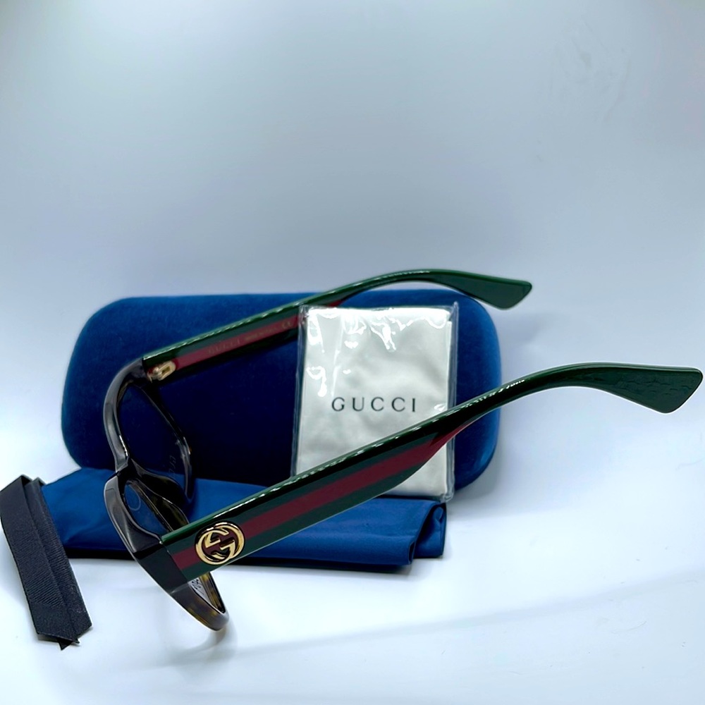NWOT! Gucci unisex optical frames. Tortoiseshell rims with green and red arms.